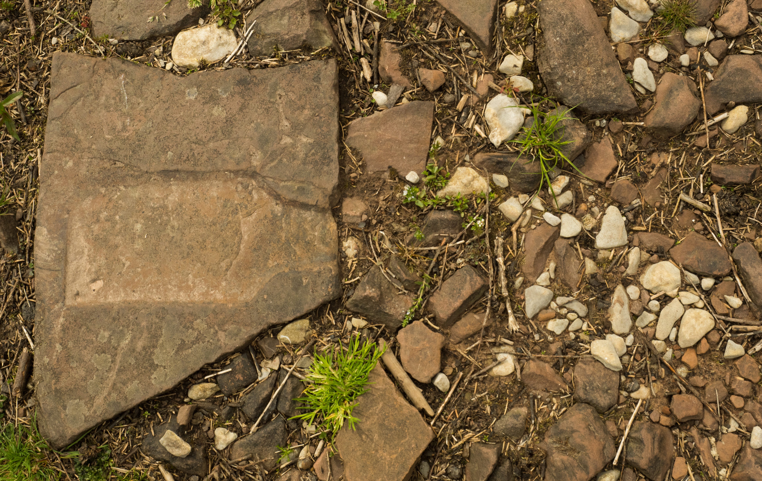 Brinore Tram Road stone with tie bar imprint and limestone ballast